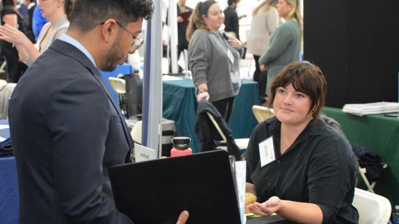 Recruiter and Penn State Abington student at the fall 2023 career fair