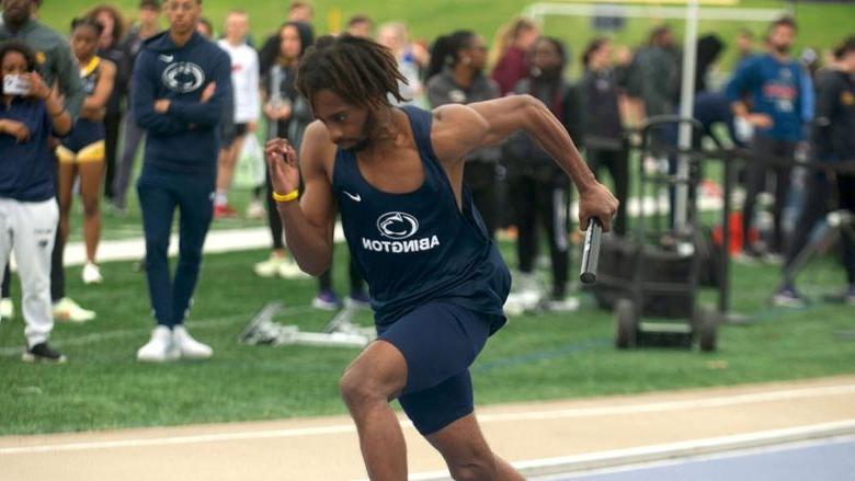 Student running in a track meet